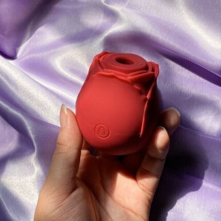 sugador estimulador de clitóris por pulsação em formato de rosa