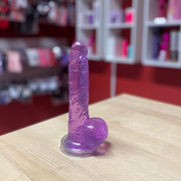pênis prótese 20,5cm x 3,8cm em silicone jelly com ventosa e escroto roxo