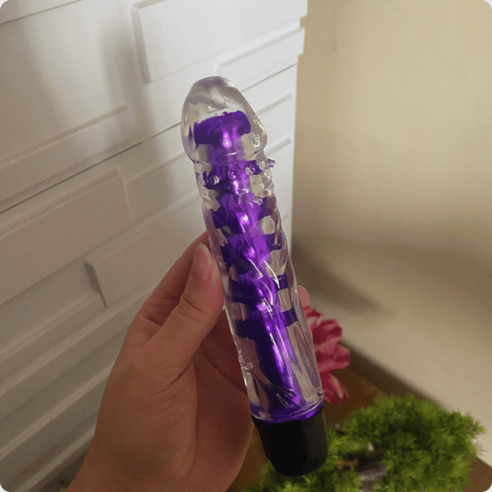 vibrador personal com capa em formato de pênis roxo